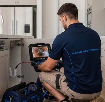 Clearing a blocked sink at a Croydon Park property
